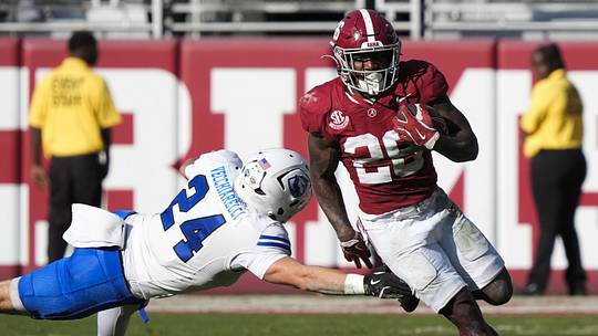 Nov 22, 2025; Tuscaloosa, Alabama, USA; Alabama running back Jam Miller (26) eludes Eastern Illinois safety Nick Vecchiarelli (24) as he runs the ball at Saban Field at Bryant-Denny Stadium. Mandatory Credit: Gary Cosby Jr.-Imagn Images